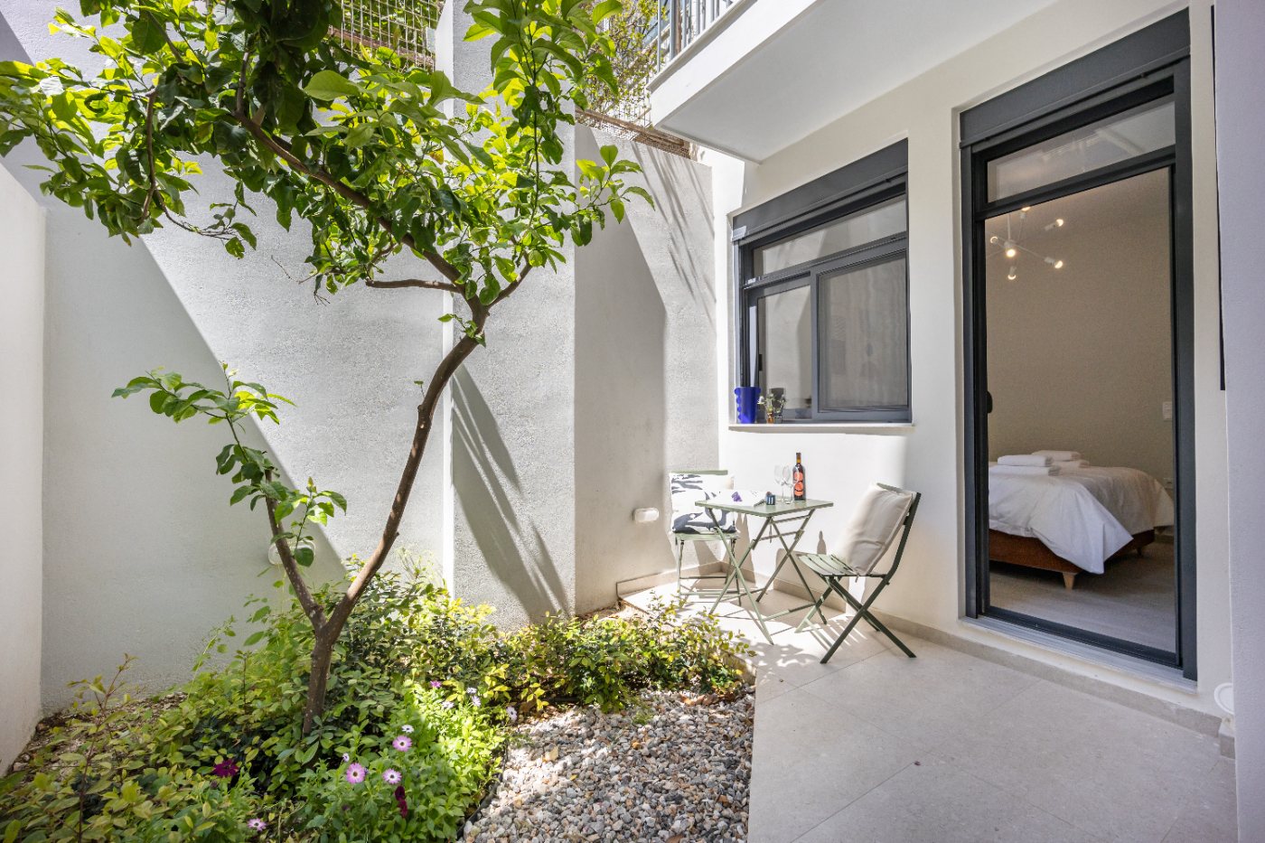 The doors from the Garden Suite open onto its private courtyard